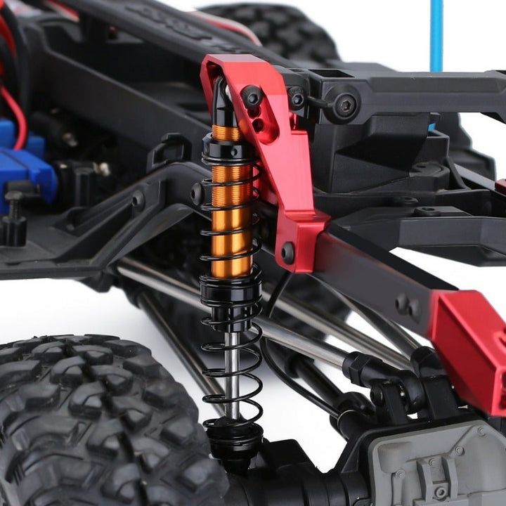 an orange Shock Absorbers on rc crawler