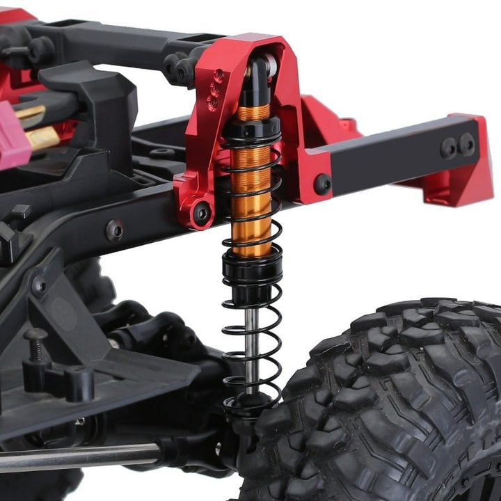 an orange Shock Absorbers on rc crawler