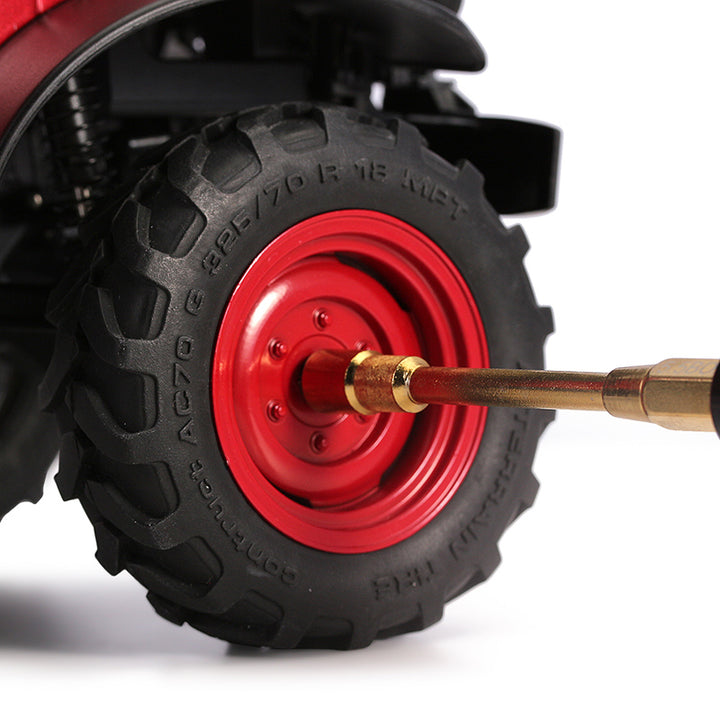 A hexagonal nut driver is screwing fcx24 wheel nut
