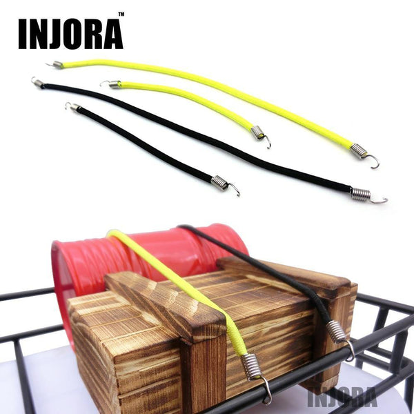 2 ropes tied the luggage to the luggage rack