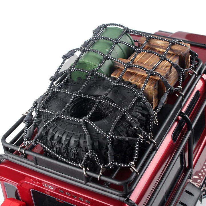 a red rc car with Luggage and Net